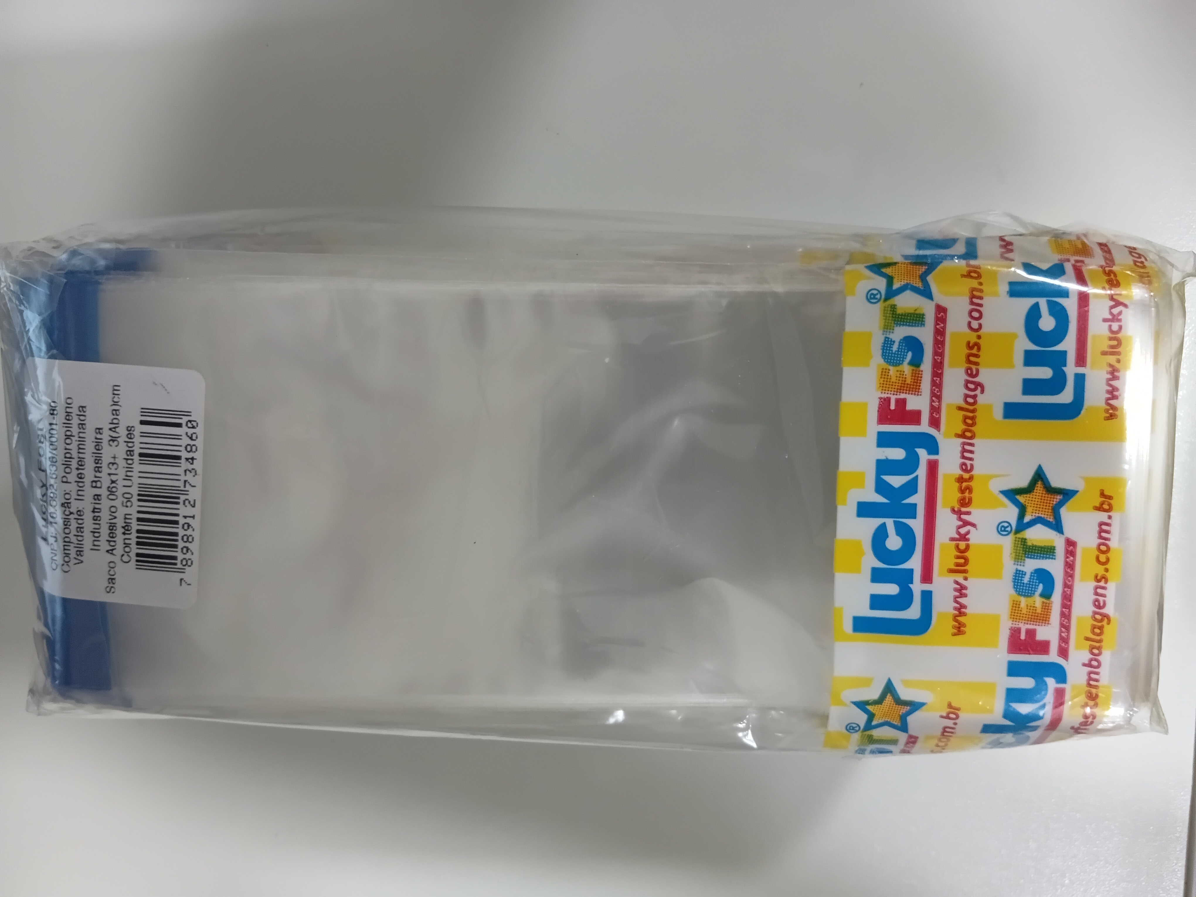 LUCKY  SACO ADESIVADO 06X13+03 ABA