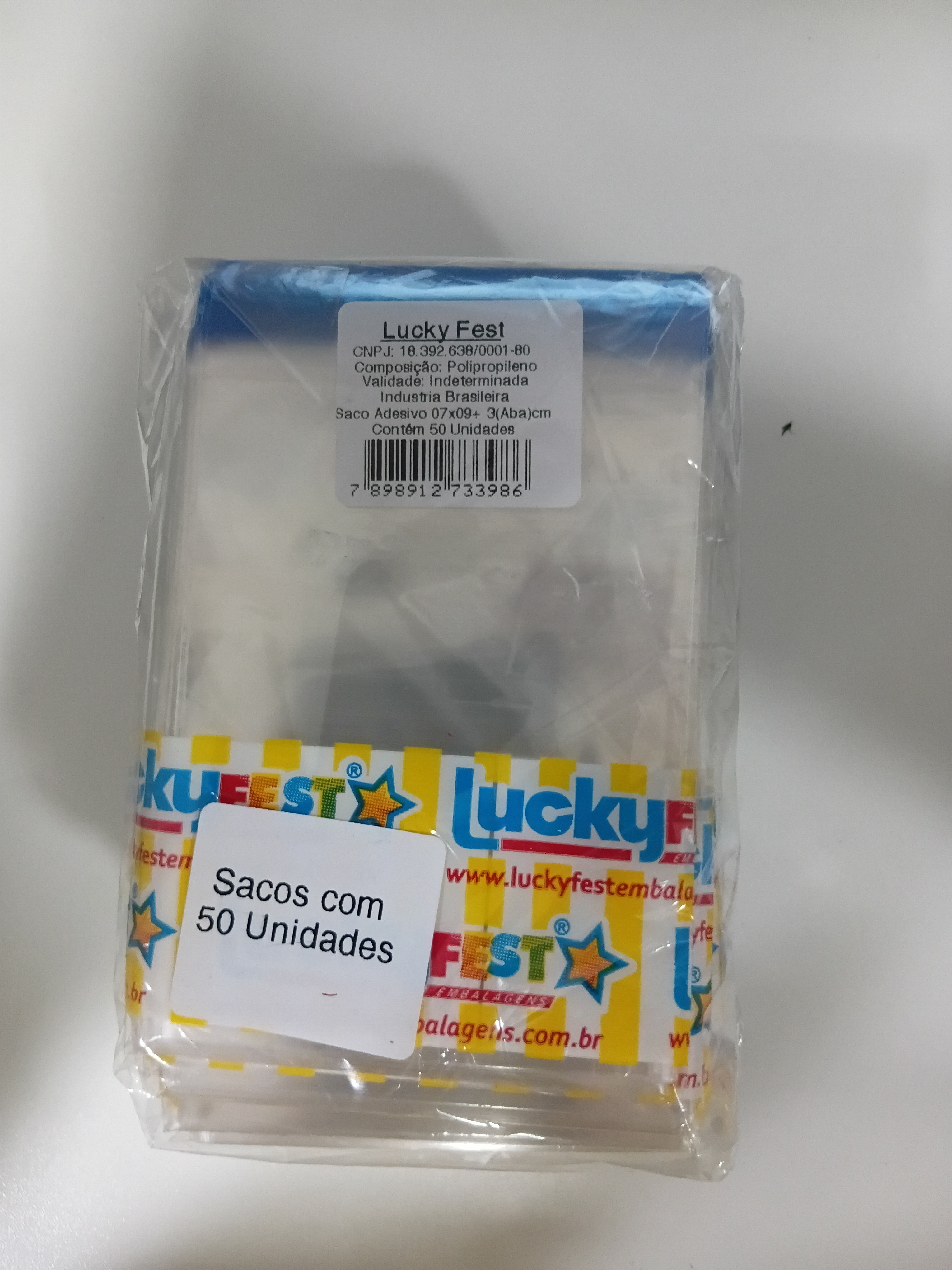 LUCKY  SACO ADESIVADO 07X09+03 ABA